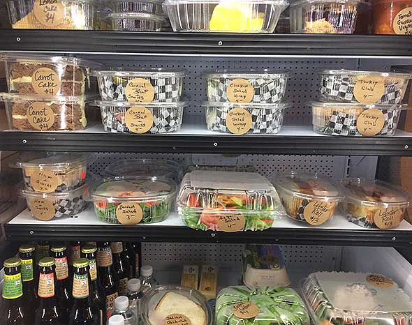 Photo of grab-n-go items in assisted living food service dining area.